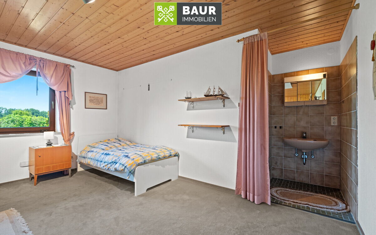 Schlafbereich im Wohnzimmer UG